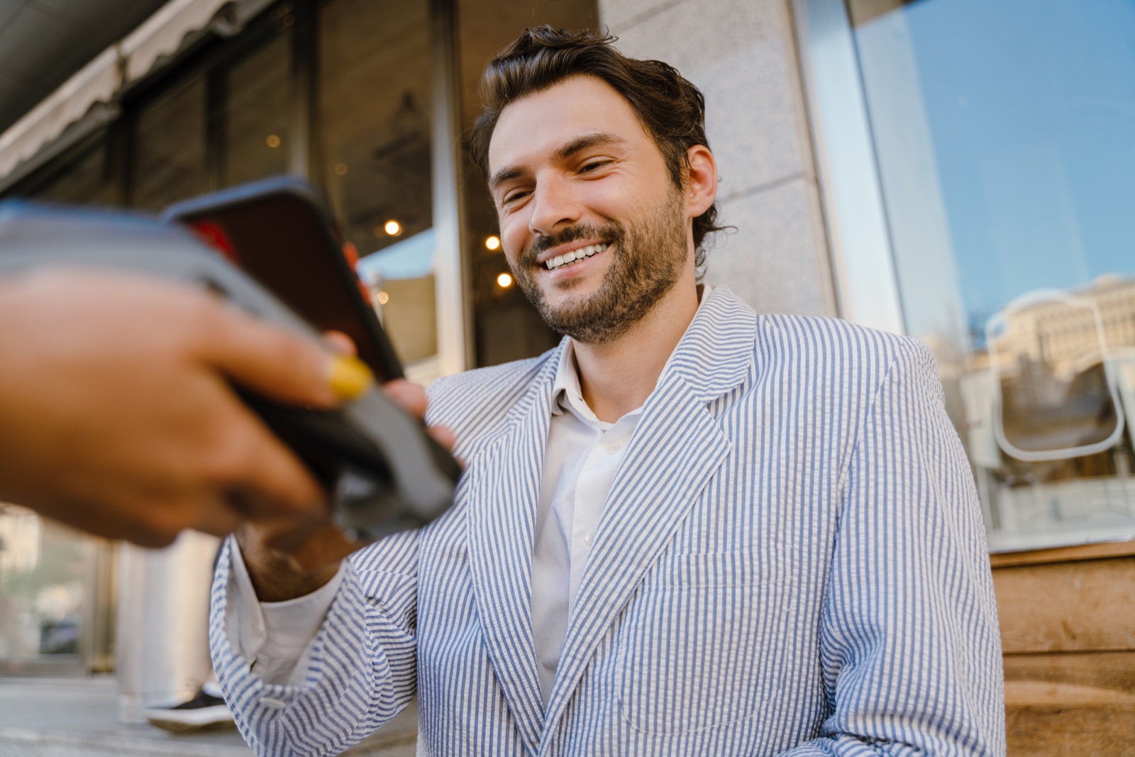 Person paying with a contactless card